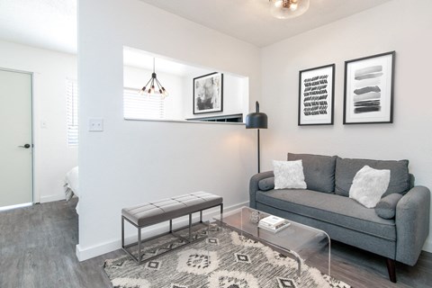 a living room with a couch and a coffee table